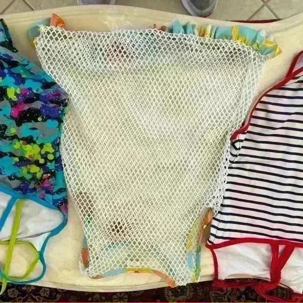 Girl’s Bathing suits and a cover-up kids size 8